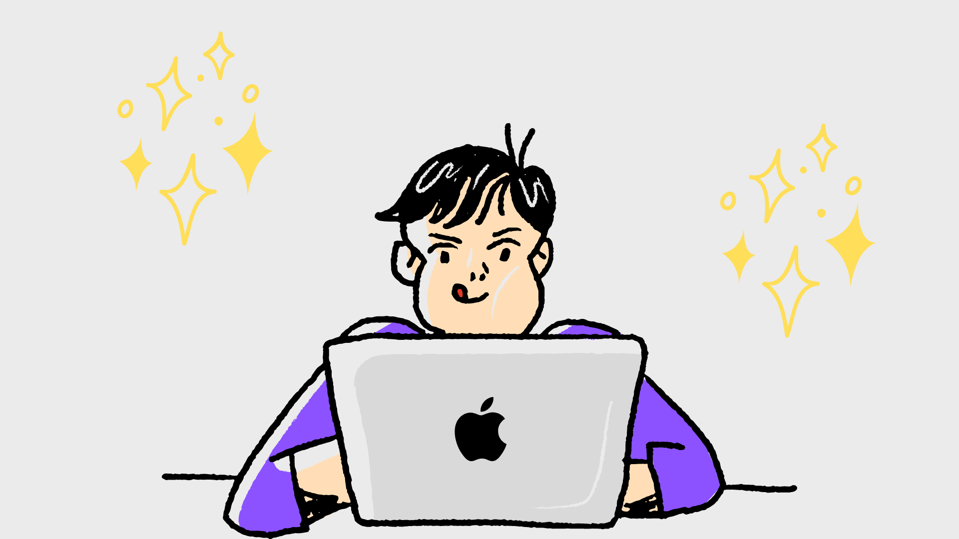 パソコンに集中している男の子